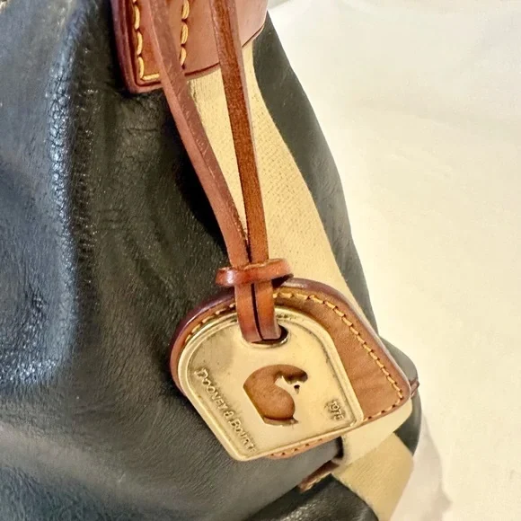 Dooney and Bourke bk purse, brass and silver hardware, yellow stitching, - Picture 3 of 16